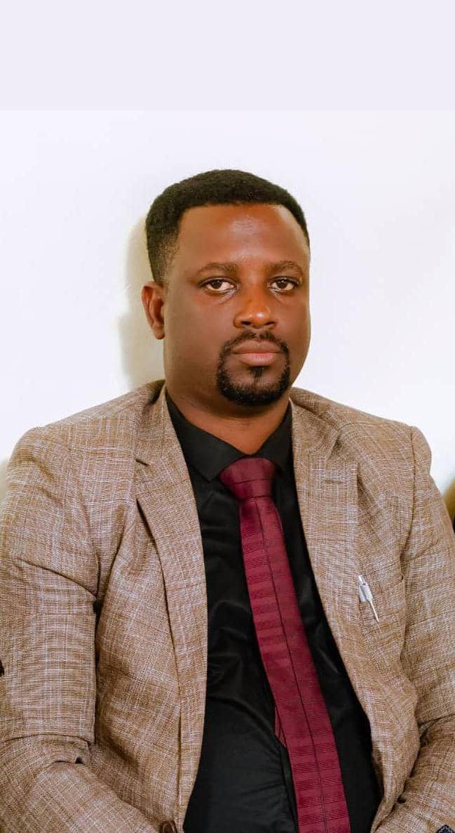 Mr. John William SHUMBUSHO